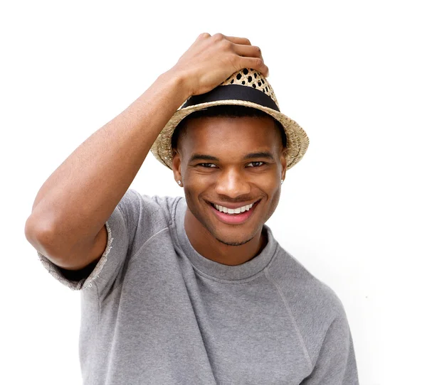 Fashionable young man smiling with hat — Stock Photo, Image