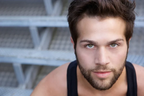 Modern young man with beard staring — Stock Photo, Image