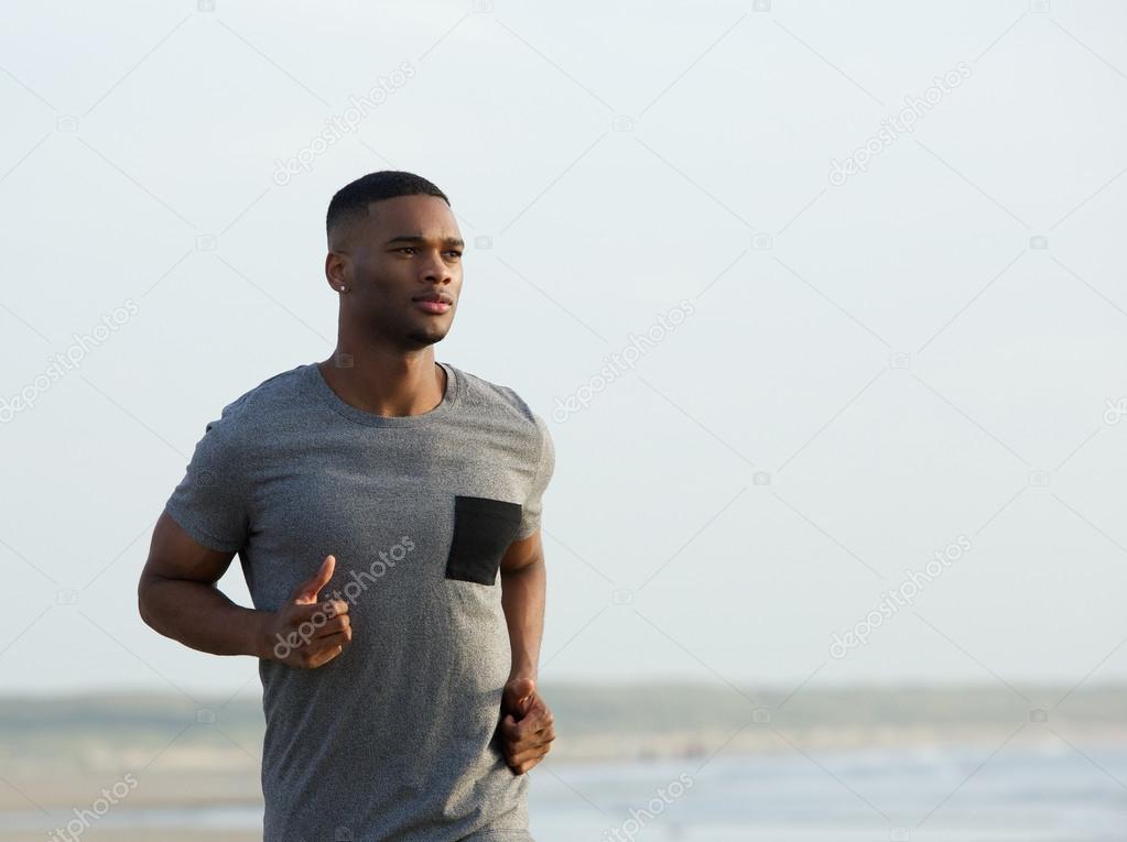 African american man running outdoors
