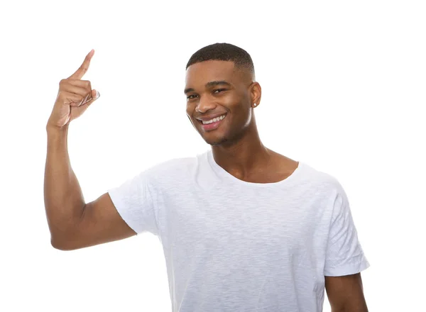 Retrato de cerca de un joven feliz señalando con el dedo — Foto de Stock