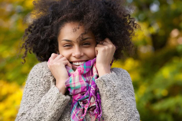 Young woman laughing outdoors in autumn — Stock Photo, Image