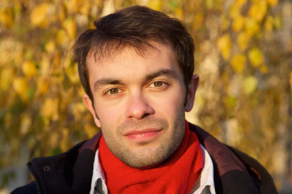 Face portrait of a young man with scarf — Stock Photo, Image