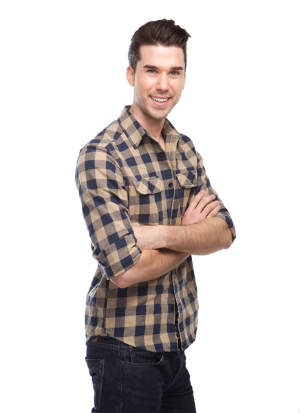 Attractive young man smiling with arms crossed — Stock Photo, Image