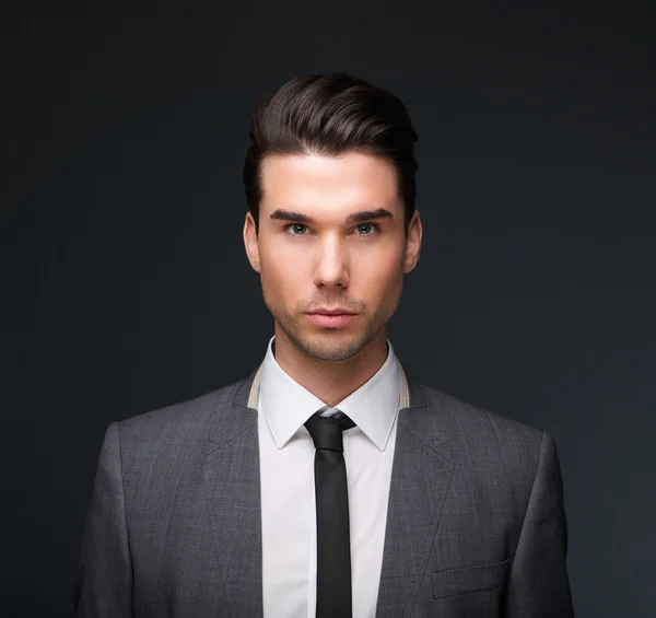 Handsome male fashion model in business suit — Stock Photo, Image