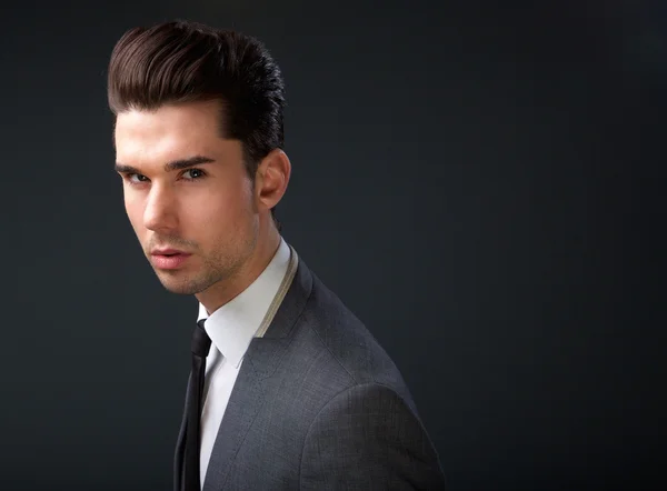 Handsome young man with cool hairstyle — Stock Photo, Image