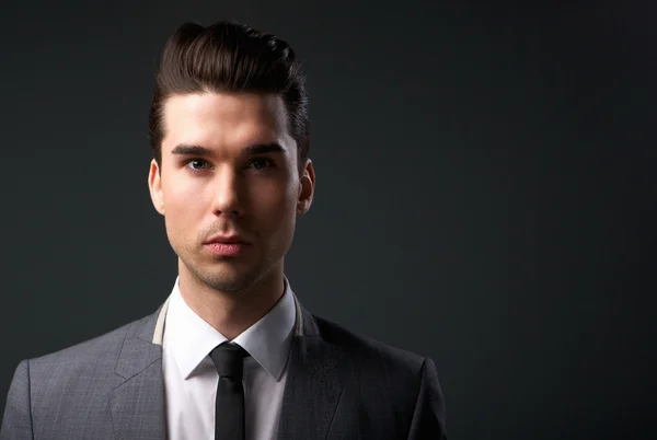 Attractive young man in suit and tie — Stock Photo, Image