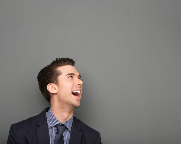 Jovem homem de negócios feliz rindo — Fotografia de Stock