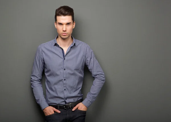 Handsome young man in smart shirt staring — Stock Photo, Image
