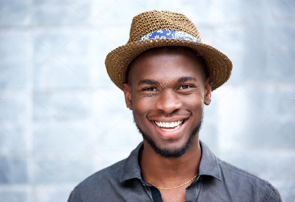 Happy african american man laughing