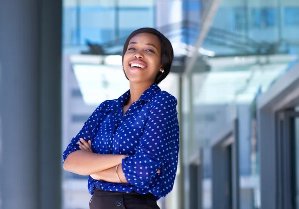 Cheerful young business woman laughing — Stock Photo, Image