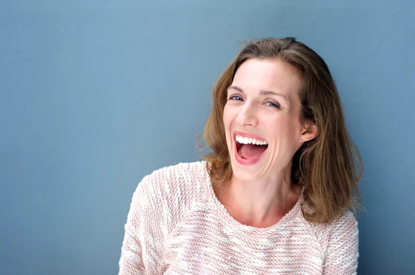 Happy beautiful fresh mid adult woman laughing — Stock Photo, Image