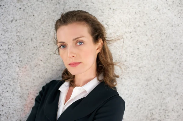 Elegant business woman with serious expression on face — Stock Photo, Image