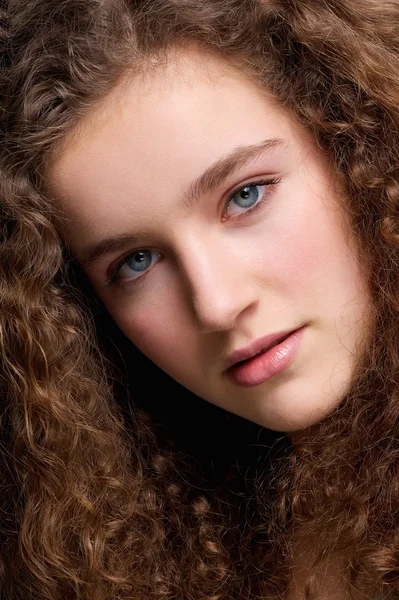 Beauty portrait teenage female fashion model with curly hair — Stock Photo, Image