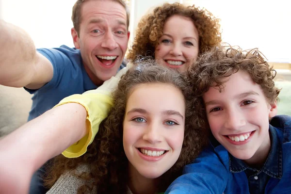 Happy family taking a selfie together — Stock Photo, Image