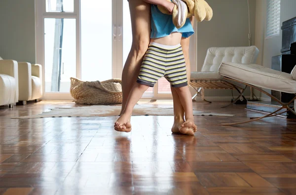 Mother and little boy walking at home — Stock Photo, Image