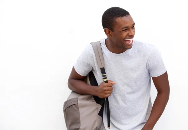 Estudiante universitario riendo con bolsa — Foto de Stock