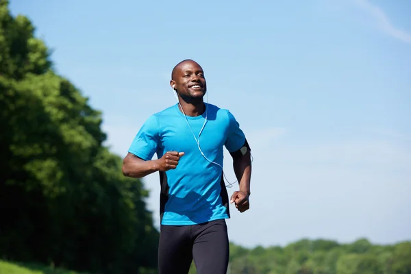 Activo afroamericano hombre corriendo — Foto de Stock