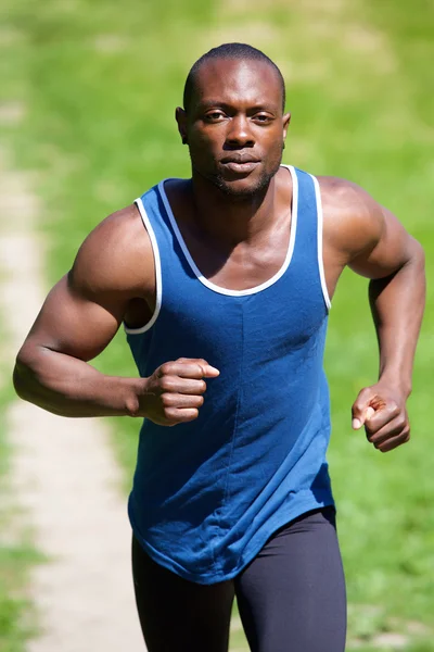 Healthy african american man running outdoors — Stock Photo, Image