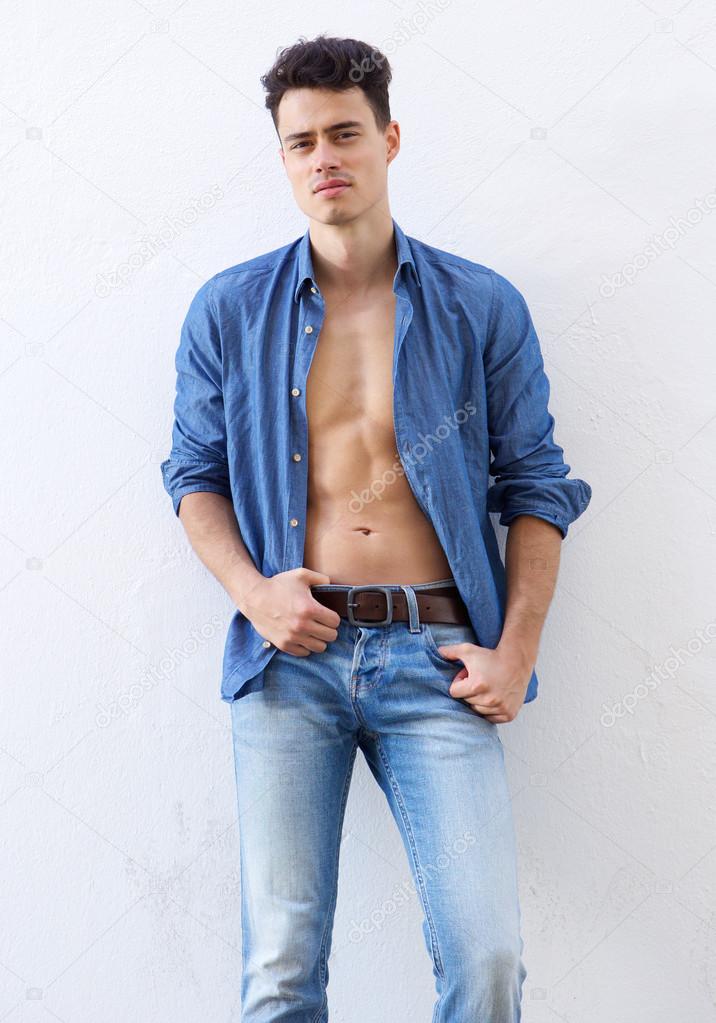 Sexy guy posing with open shirt