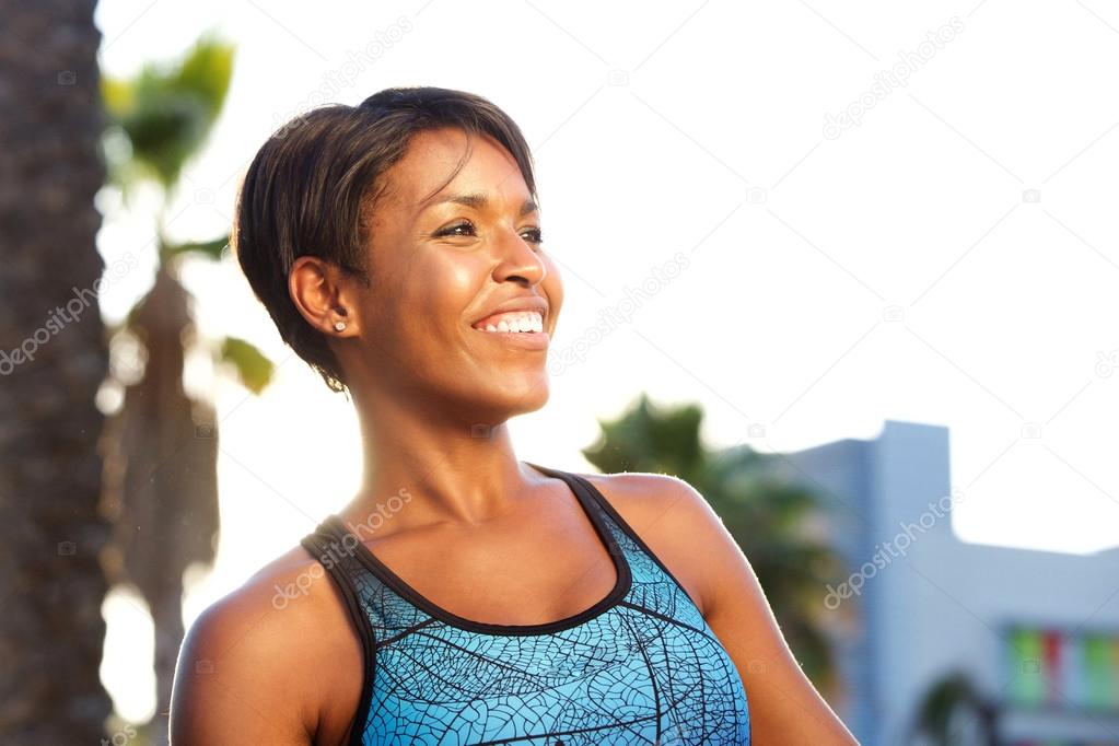 Cheerful african american sporty woman