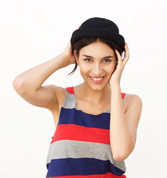 Confident young woman smiling with hat — Stock Photo, Image