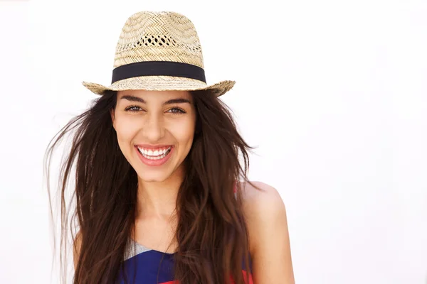 Close up portrait of an hispanic girl smiling with hat — Stockfoto