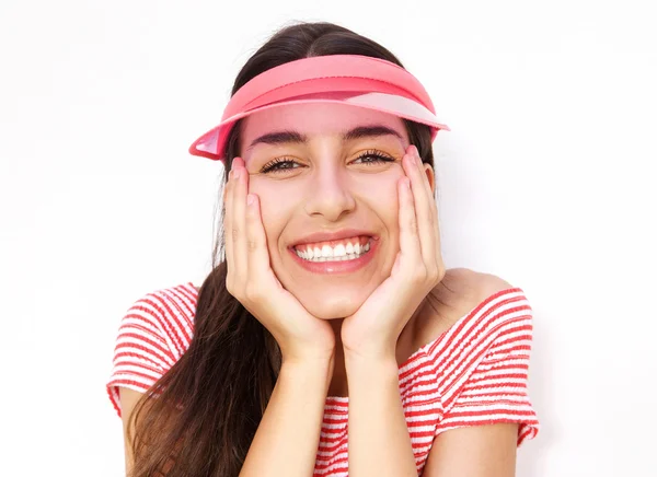 Cute young woman smiling with hands on cheek — ストック写真