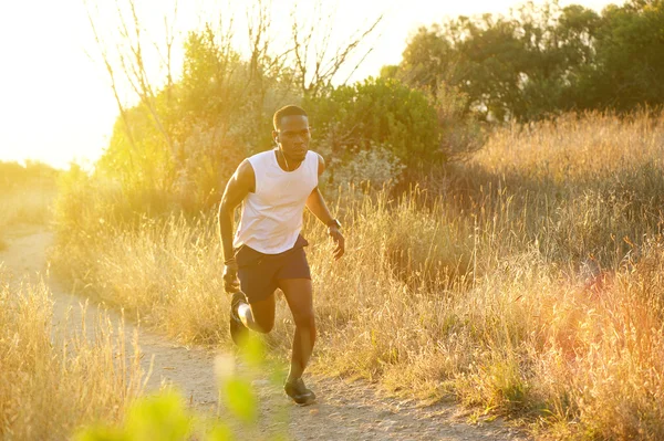 Fit young black man running exercise outdoors — Stock Photo, Image