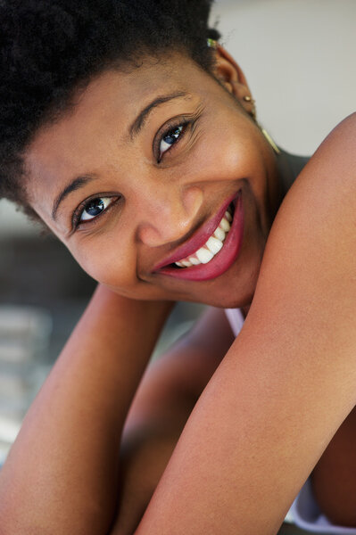Close up portrait of a smiling african american young woman