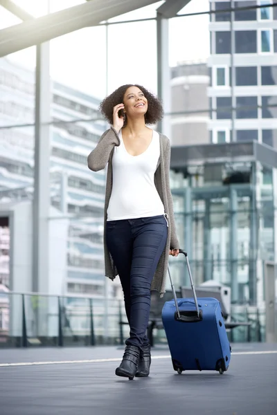 Smiling african american travel woman