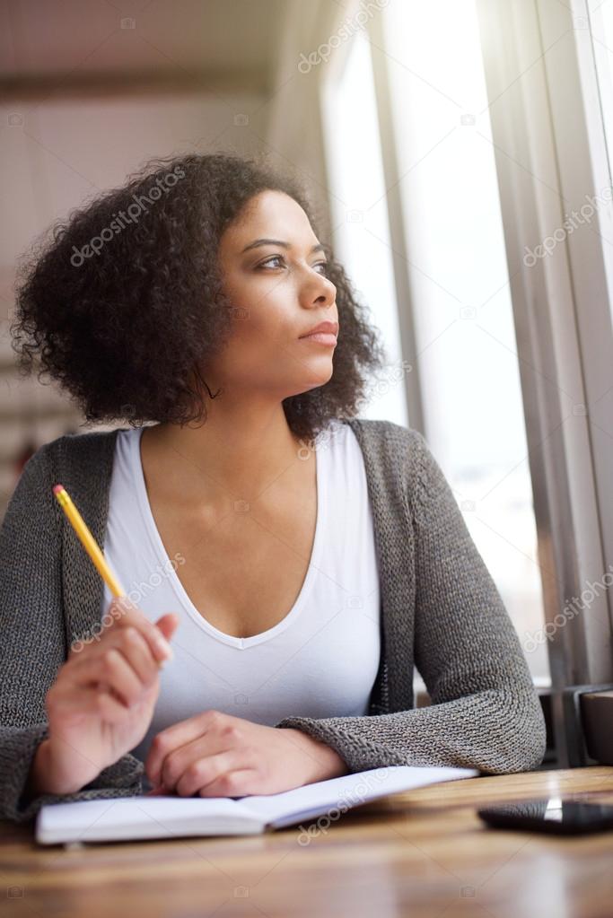 Young african american woman thinking