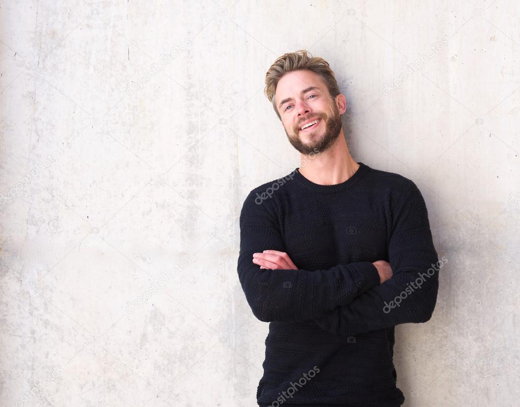 Fashionable man with beard laughing