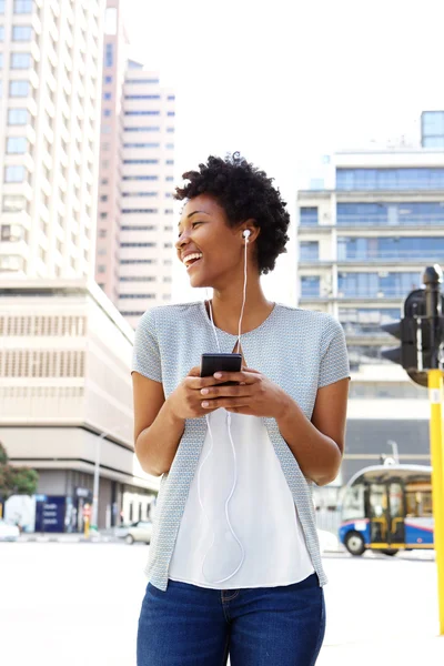 Woman enjoying listening to music — Stock Photo, Image