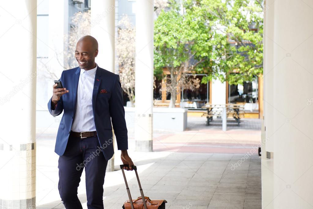 Businessman traveling with a mobile phone