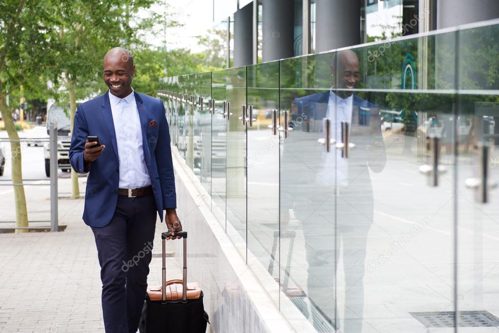 Businessman looking at mobile phone