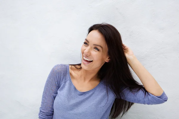 Cheerful woman laughing