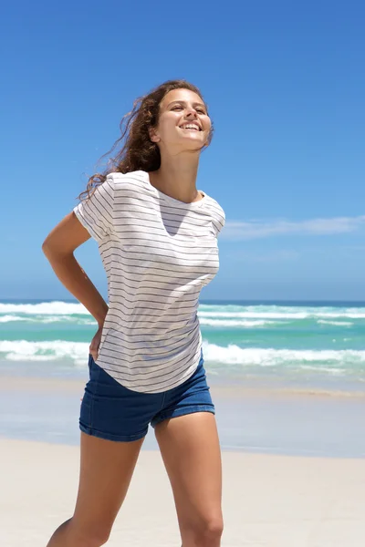 Smiling young woman in shorts — Stock Photo, Image