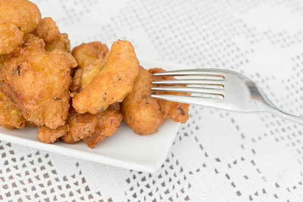 Detail van sommige kabeljauw fritters — Stockfoto