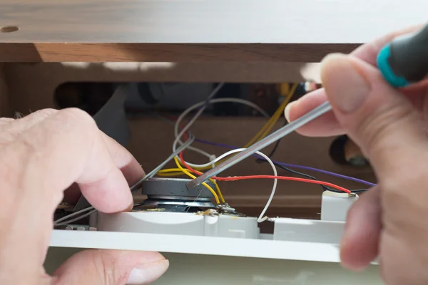 Repairing clock radio — Stock Photo, Image