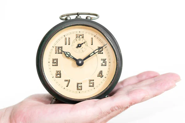 Clock in a hand — Stock Photo, Image