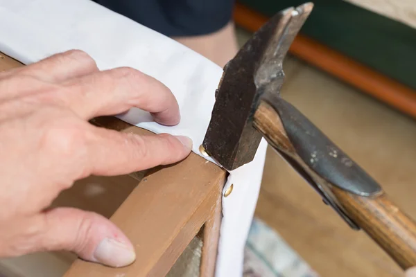 Renewal of the upholstery of a chair — Stock Photo, Image