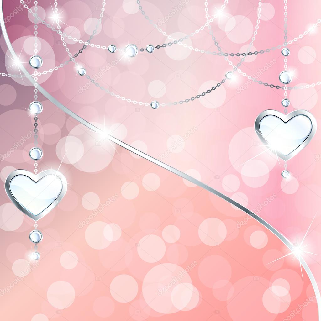 Sparkly peach pink background with silver heart-shaped pendants