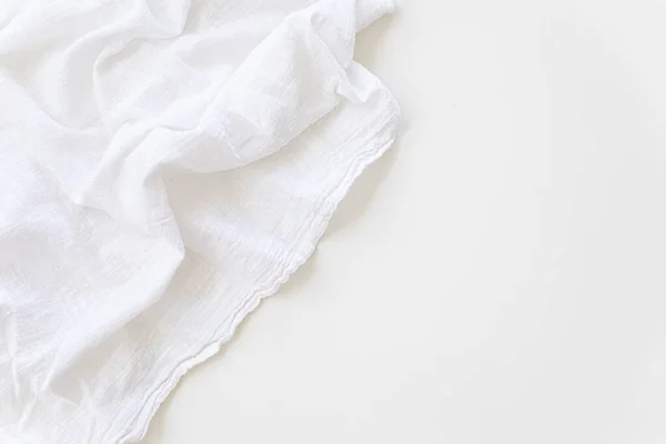 Fondo blanco sobre textiles de color claro. —  Fotos de Stock