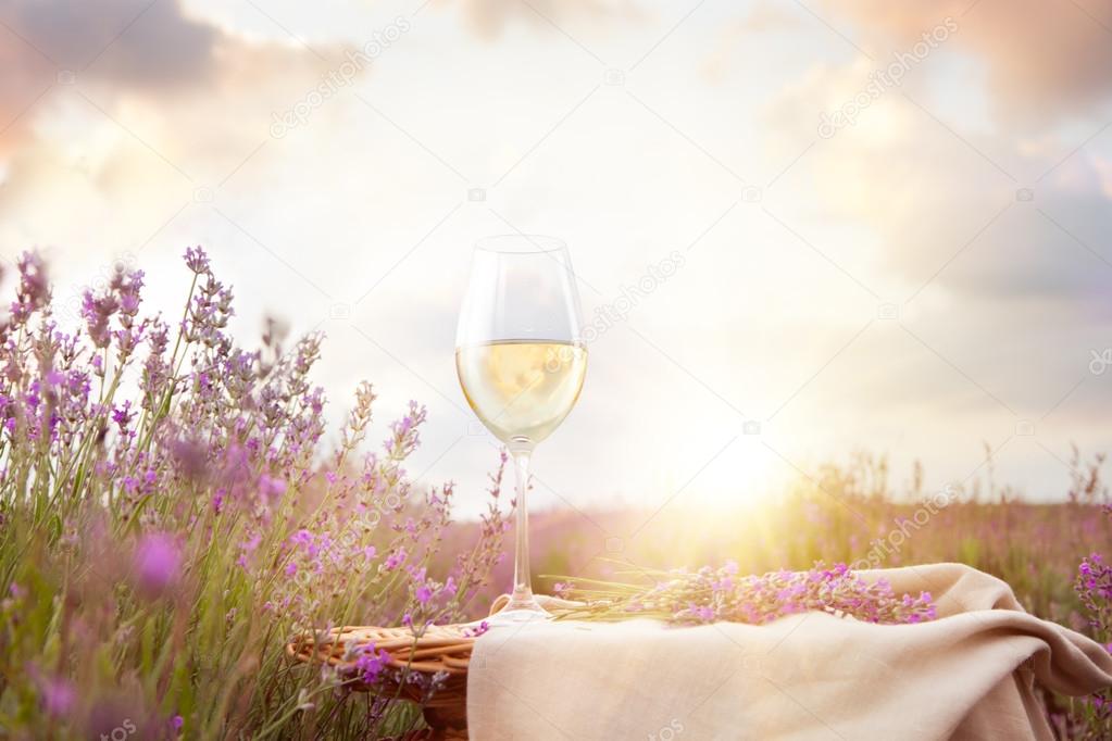 Bottle of wine against lavender.