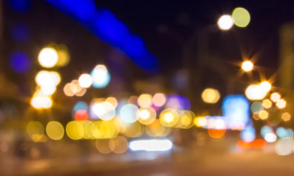 Fondo abstracto de las luces difusas de la calle de la ciudad — Foto de Stock