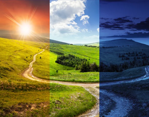 Cross road on hillside meadow in mountain — Stock Photo, Image