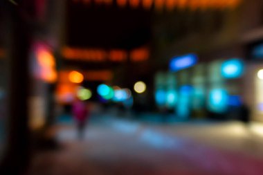abstract christmas background. blurred city street lights at night. defocused photo. winter holiday concept. festive urban scene backdrop of uzhhorod with bokeh effect. bright and colorful circular decorations
