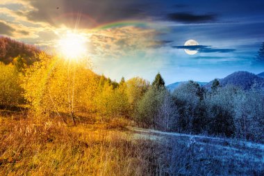 Sonbahar ekinoksunda ormanlı dağ manzarası. Gündüz ve gece zaman kavramını değiştirir. Alacakaranlıkta güneş ve ay ile renklendirilmiş huş ağaçları olan doğa parkı. yatay astroloji arkaplanı