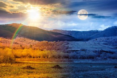 İlkbaharın başlarında dağlarda kırsal alan. Gündüz ve gece zaman kavramını değiştirir. Güzel bir kır manzarası var. Alacakaranlıkta güneş ve ay var. eşitlik ve kayma şablonu