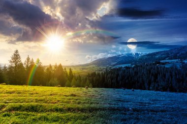 İlkbaharda dağlık kırsal alan. Gündüz ve gece değişiyor. Alp çayırlarının arkasındaki kozalaklı orman güneş ve ayın altında yeşil otlarla kaplıydı. Uzak karlı tepe manzaralı